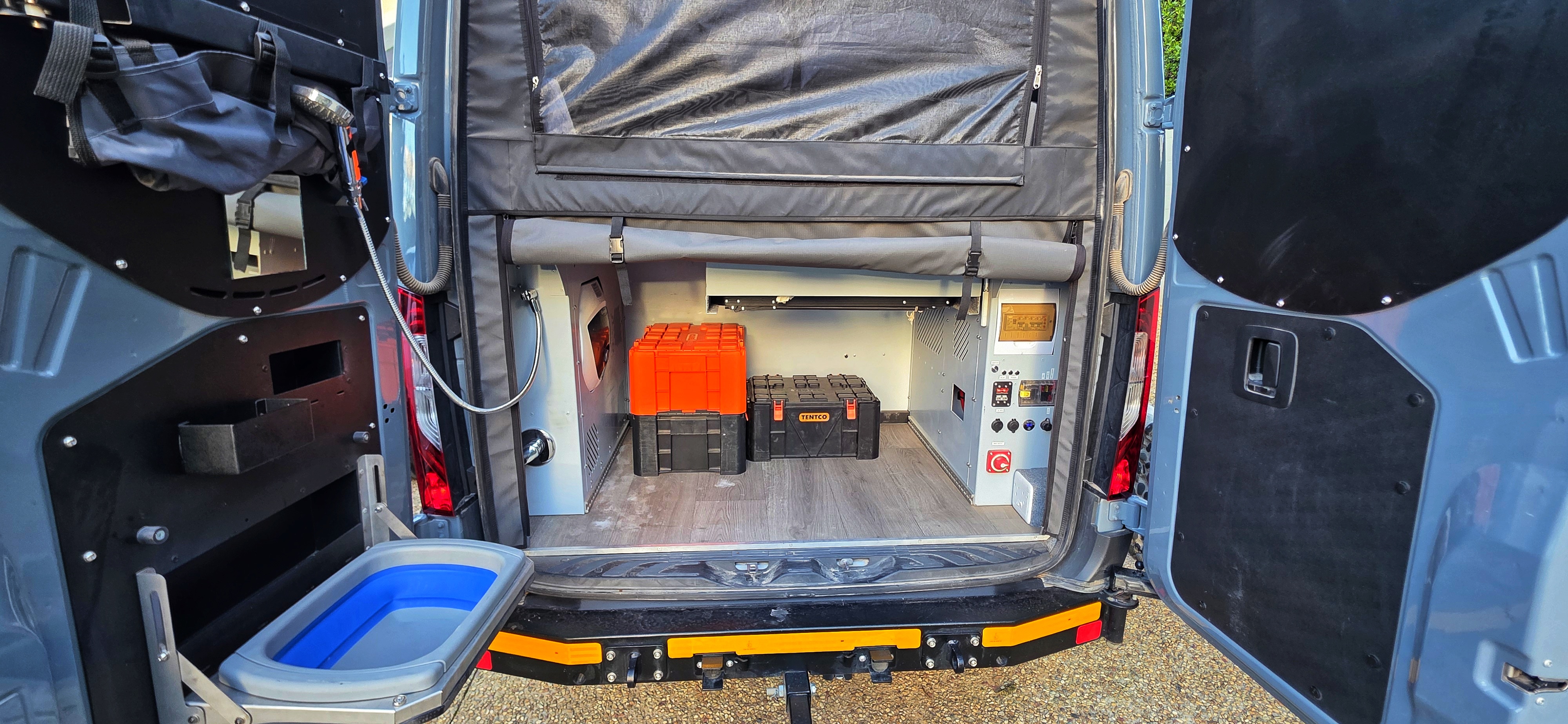 Essential vehicle gear including a dual compressor and 4x4 recovery kit.